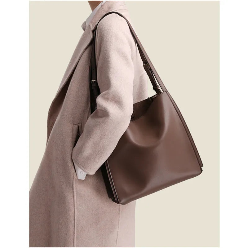 Brown genuine leather women's shoulder bag with double straps and multiple internal compartments