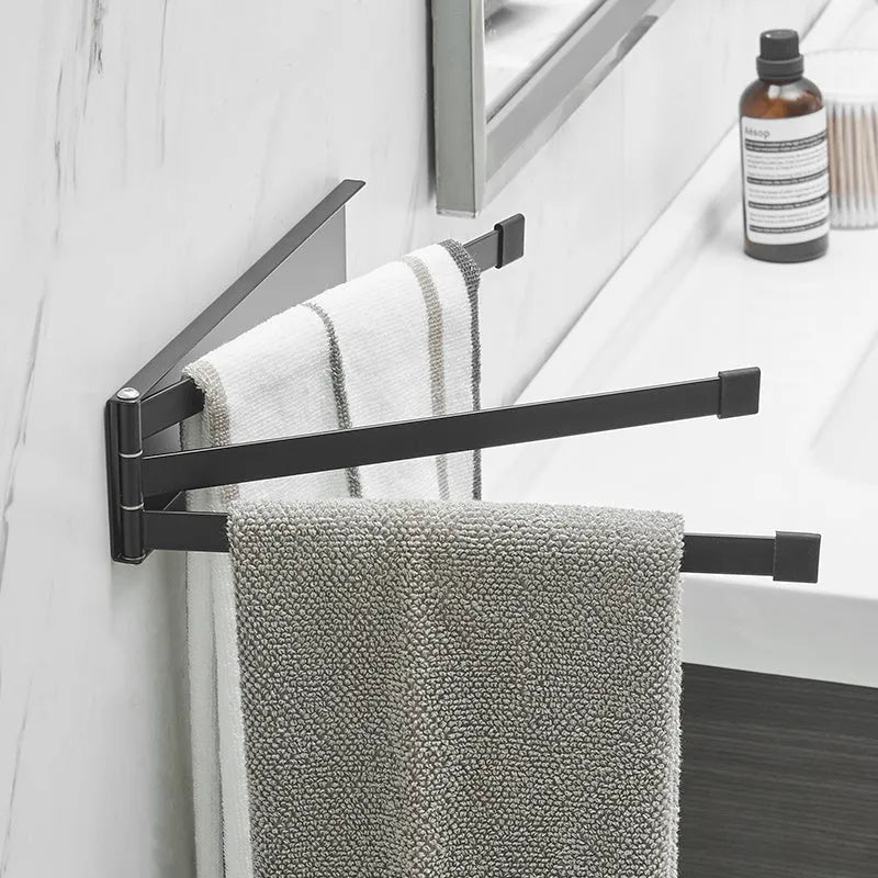 Nordic style folding towel rack in black mounted on bathroom wall without drilling