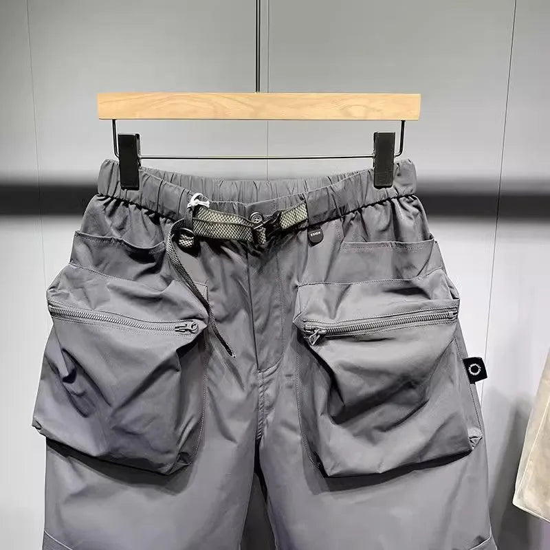 Men's large size work shorts with pockets in black or grey with straight-leg styling