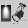 LED track spotlight with aluminium shell in black or white, available in 7W 12W 18W power outputs with warm yellow neutral white light options