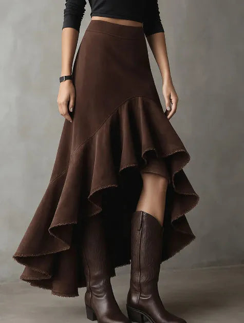 Western brown high-low maxi skirt with ruffled ankle hem laid flat.