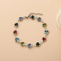Geometry heart bracelet with devil's eye design in stainless steel showing six colour options