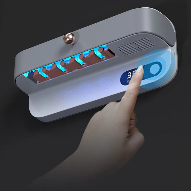 White wall-mounted smart toothbrush steriliser with USB port and button control