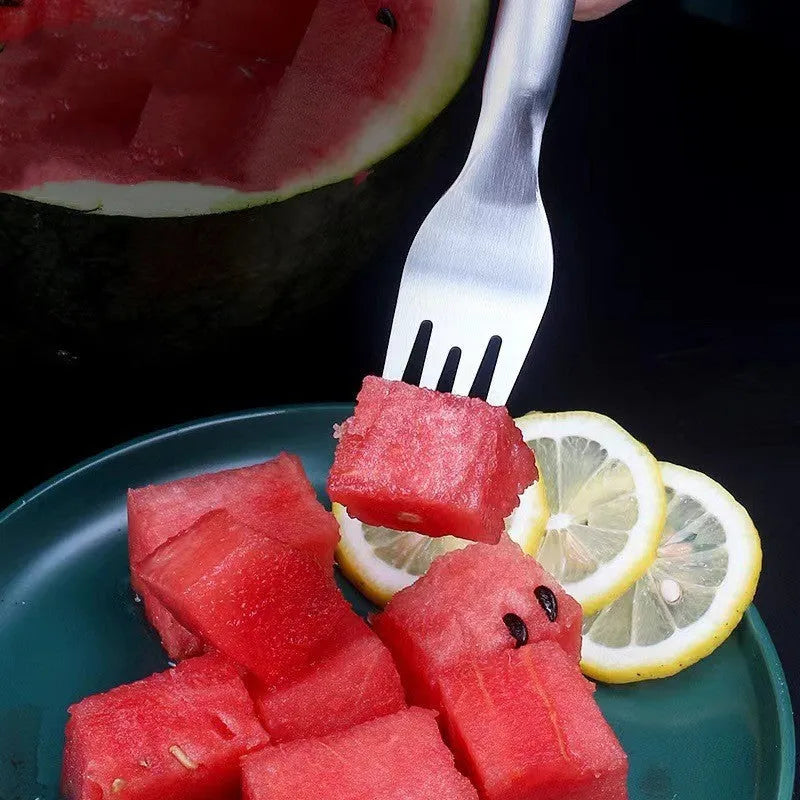Silver stainless steel watermelon fork slicer with extended handle and rounded fork head