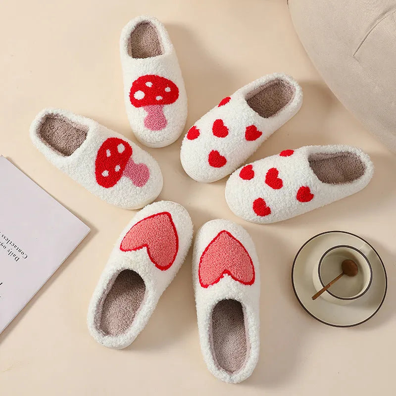 Womens plush cartoon slippers with a round toe and non-slip PVC sole in various colour designs.