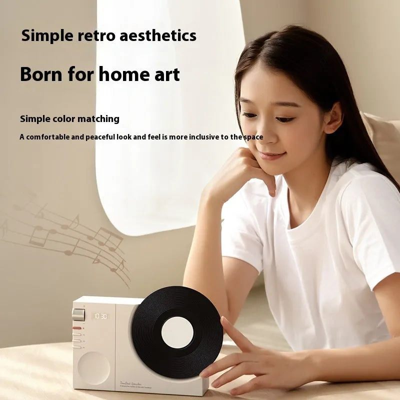 Mini portable Bluetooth speaker in Obsidian Black colour with included gift bag and greeting card