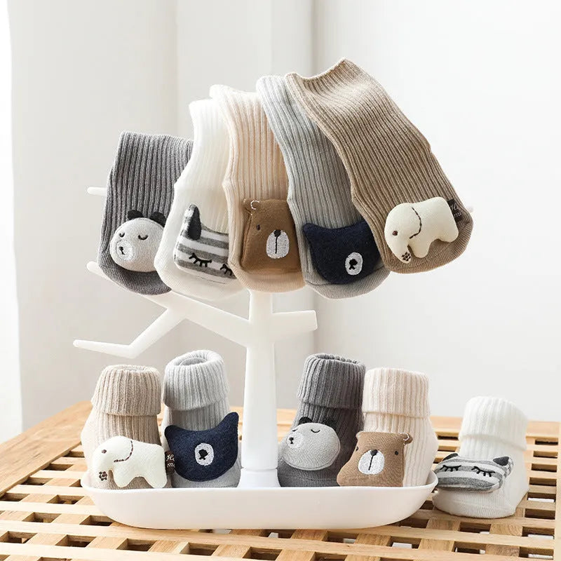 Baby socks with silicone anti-slip grips on sole, mid-height tube design in combed cotton
