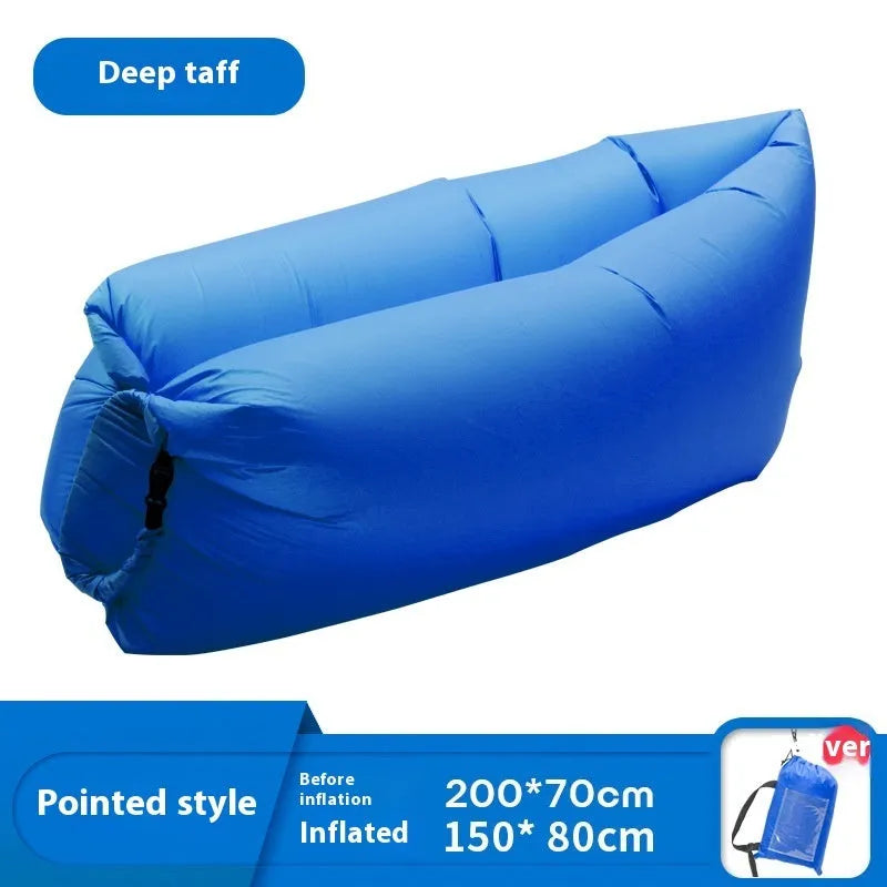 Inflatable portable sofa in a colourful design, shown folded to its 36cm by 27cm size and in use outdoors.