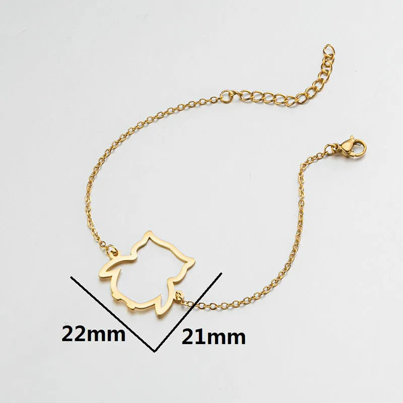 Stainless steel bracelet with small hollow owl pendant on simple chain