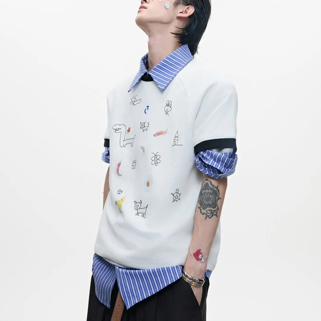 Man wearing a blue loose-fit short-sleeve shirt with a large cartoon print on the front.