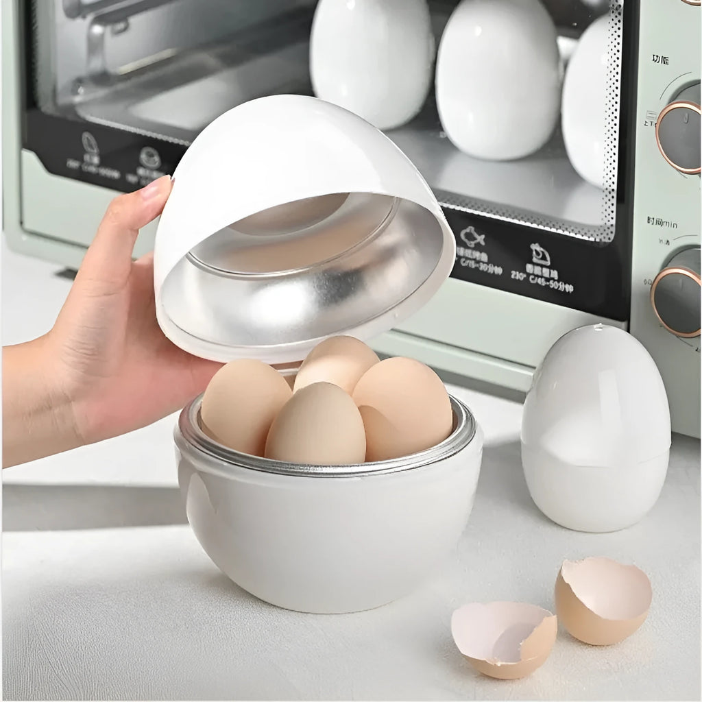 White microwave egg cooker with capacity for four eggs on a kitchen counter.