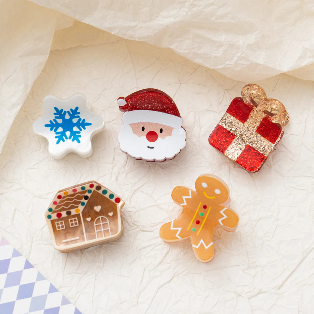 Oil-finished acrylic Christmas series small jaw clip barrette with snowflake design on white background