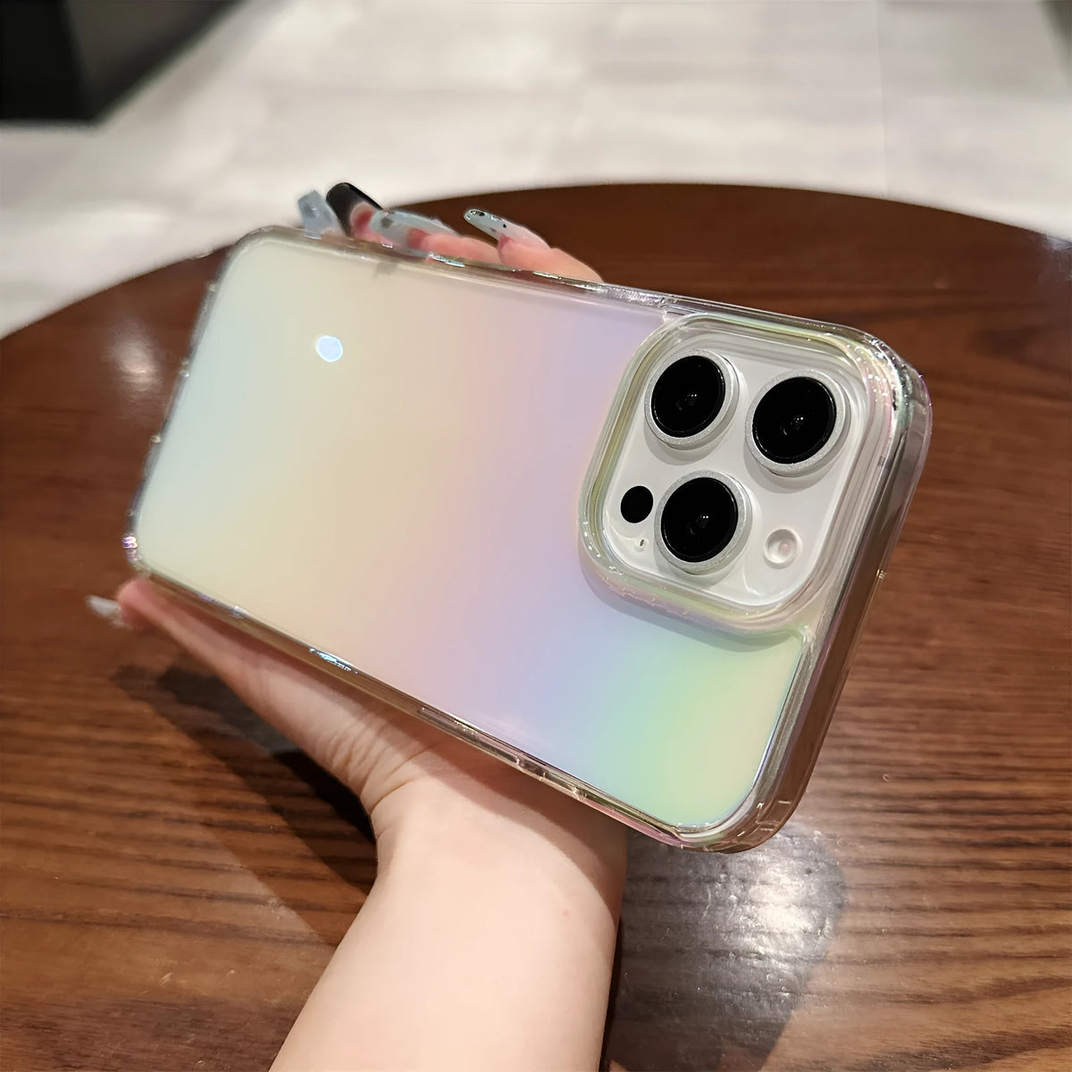 Colourful PC TPU phone case with mirror finish for iPhone 15 series, pink and purple options shown