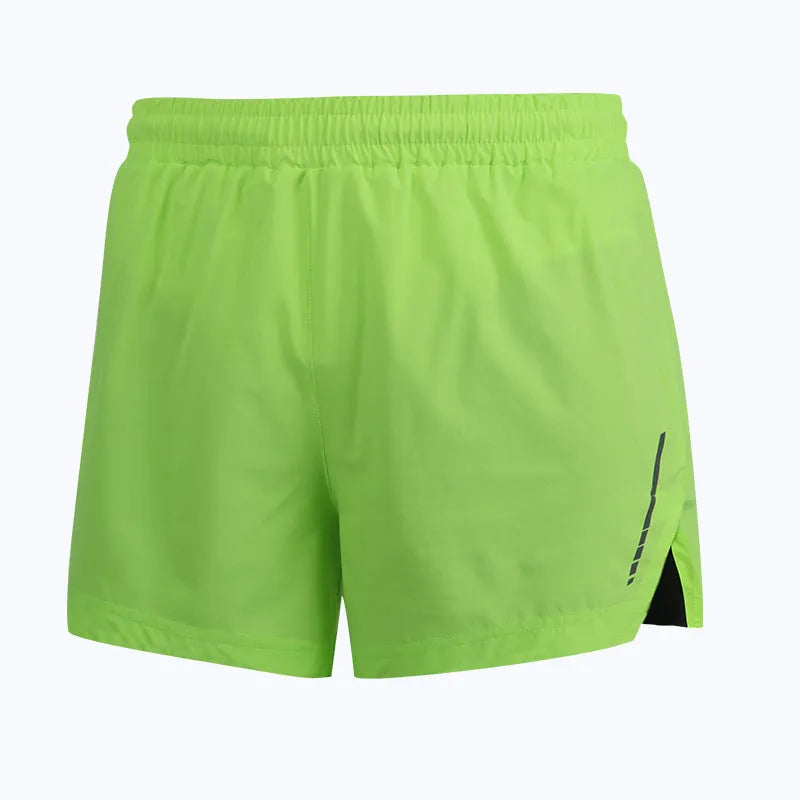 Man wearing gray quick-dry marathon running shorts, straight leg fit, for athletic training.