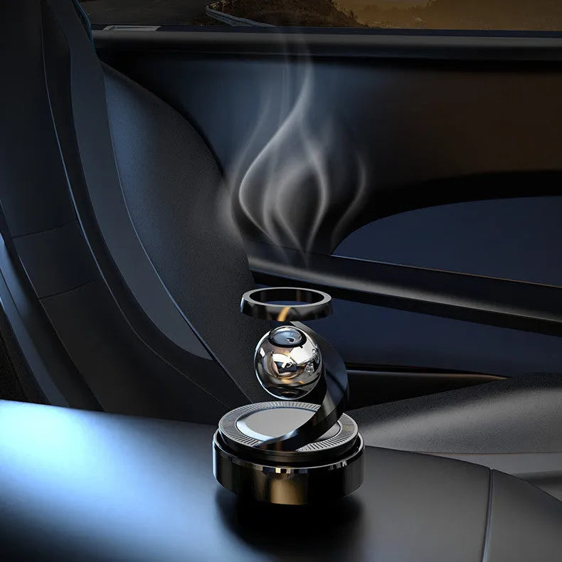 Solar-powered car fragrance ornament with decorative design for dashboard