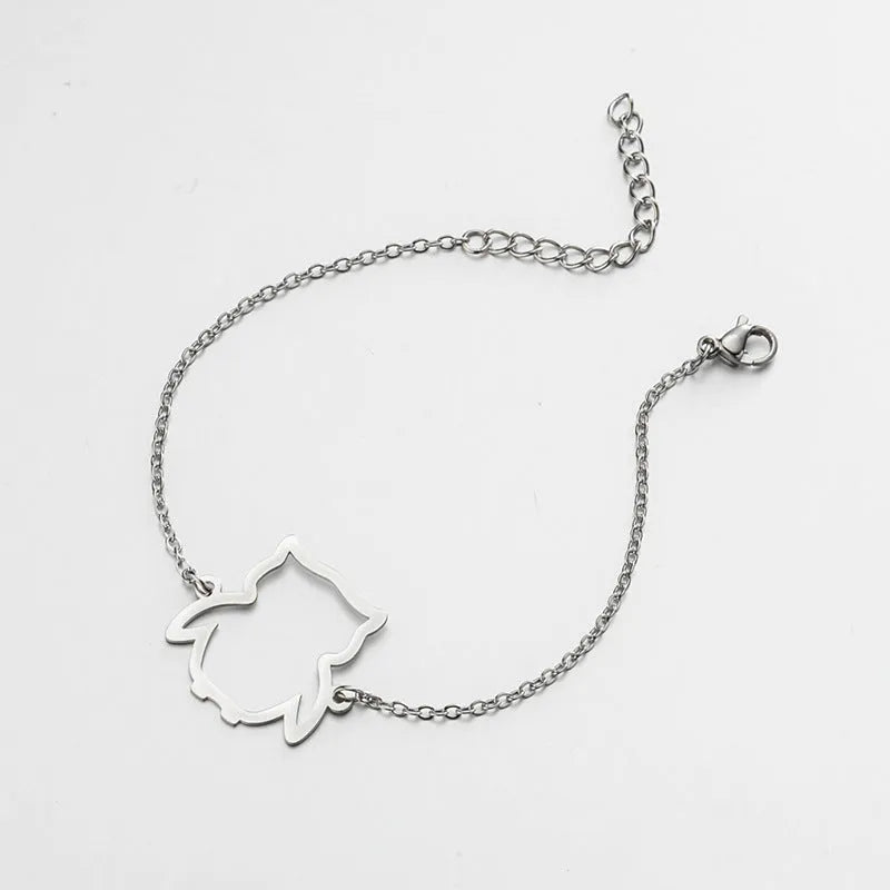 Stainless steel bracelet with small hollow owl pendant on simple chain