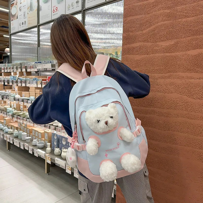 Literary style school backpack in macaron colours with curved shoulder straps and 20-35L capacity