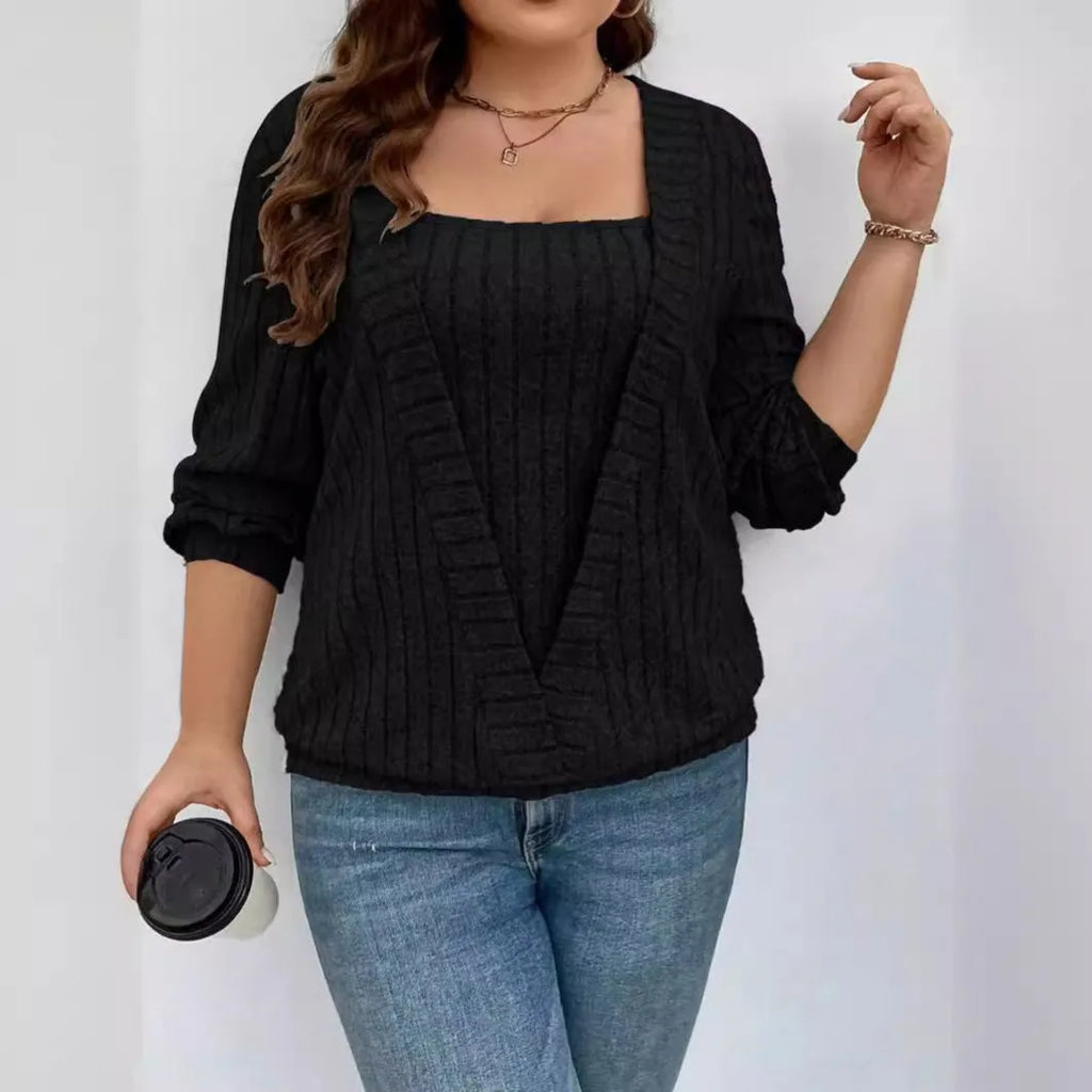 Women's solid colour rib fabric V-neck long sleeve false two-piece top in loose fit.