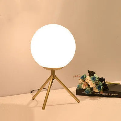 Creative LED table lamp with glass shade in three size options and three-tone light adjustment