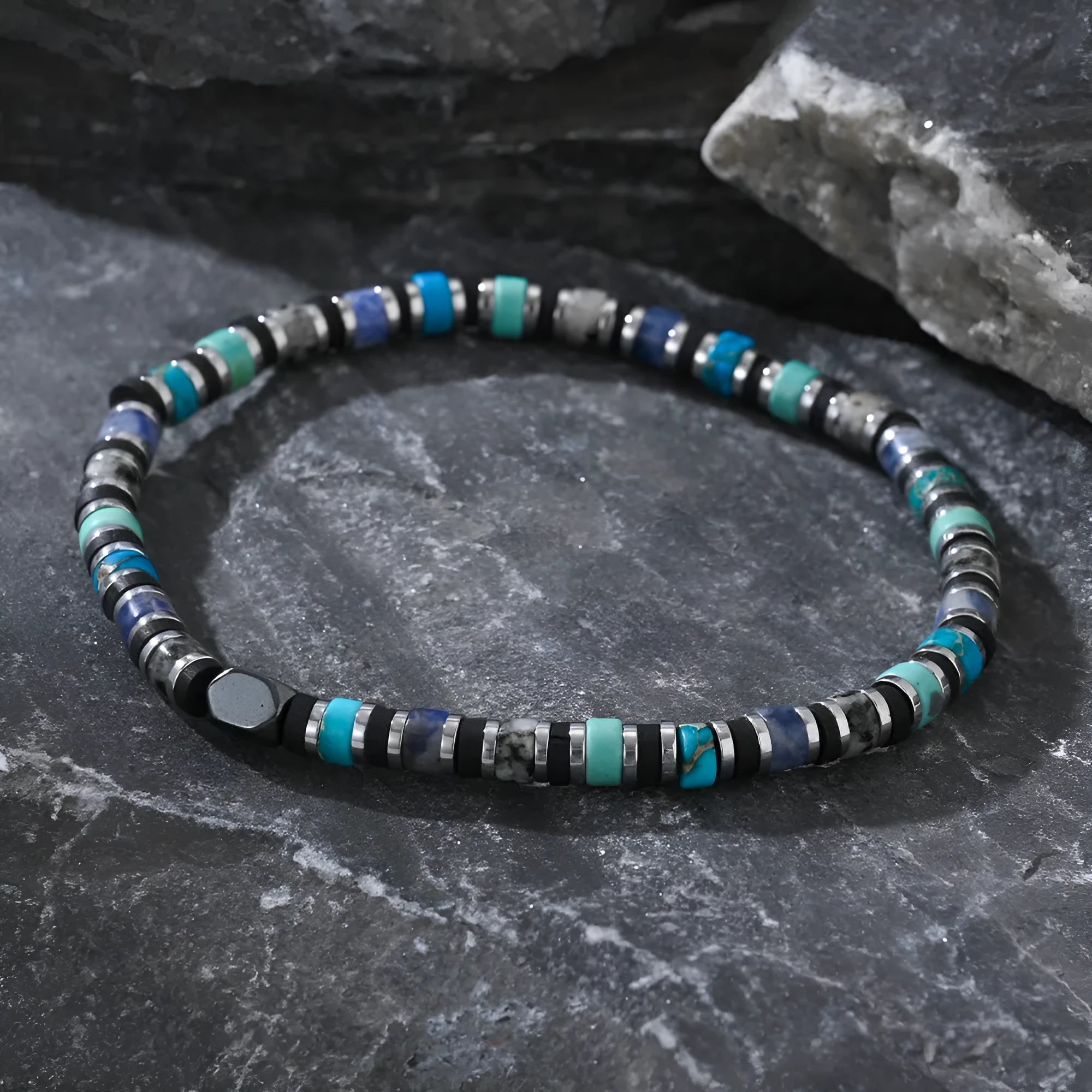 Cylindrical semi-precious stone bracelet with geometric design and hand-woven construction
