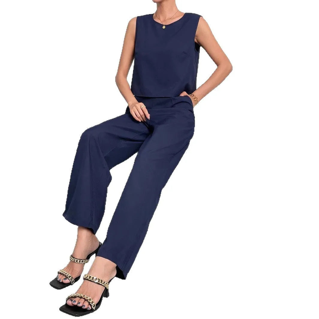 Women's red polyester two-piece set with sleeveless round neck top and wide leg trousers