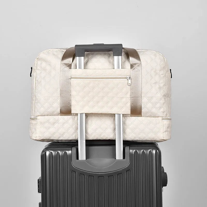 Large solid-colour Oxford cloth travel bag with a 36-55 litre capacity for buggies.