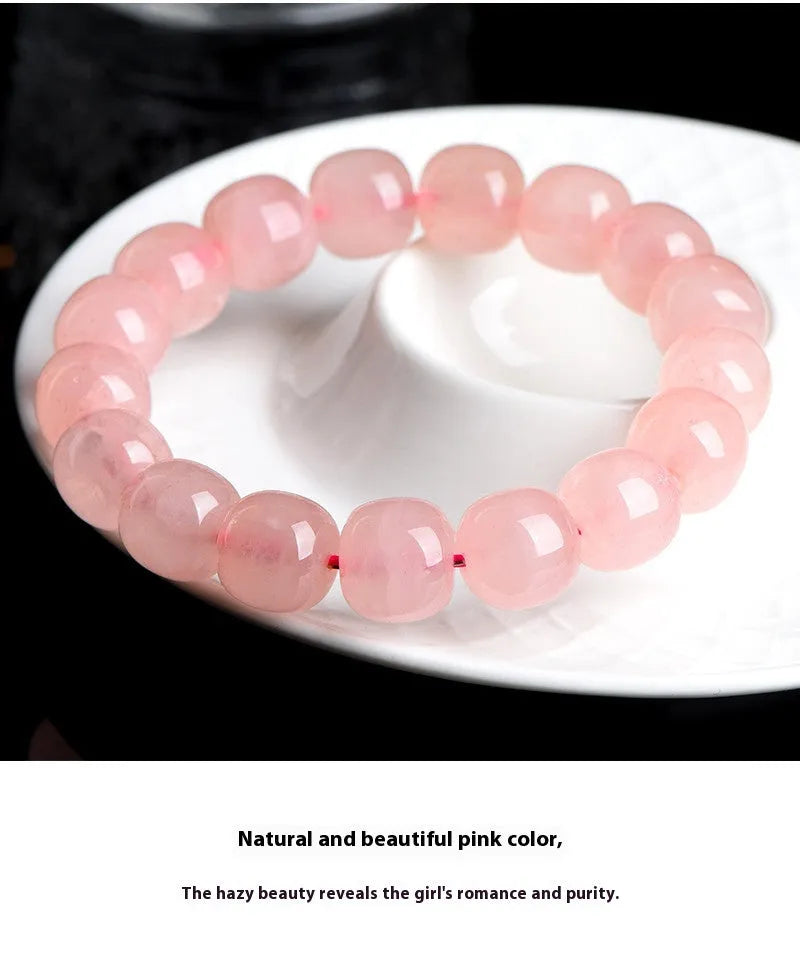 Pink crystal barrel bead bracelet with 8-10mm polished geometric beads