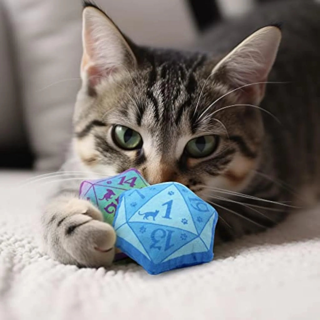 Blue dice-shaped catnip toy with dot markings on cube faces