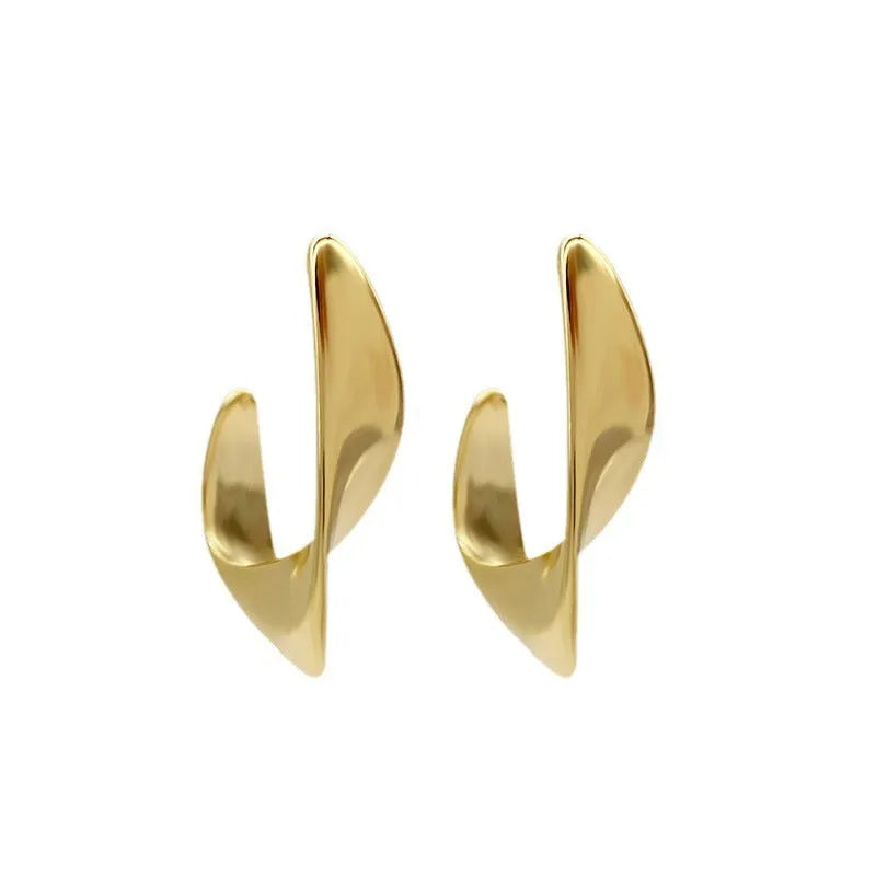 Twisted geometric metal earrings with round element in gold or silver electroplated finish