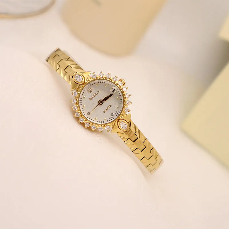 Gold quartz bracelet watch for women with 6mm thickness and embossed vintage detailing