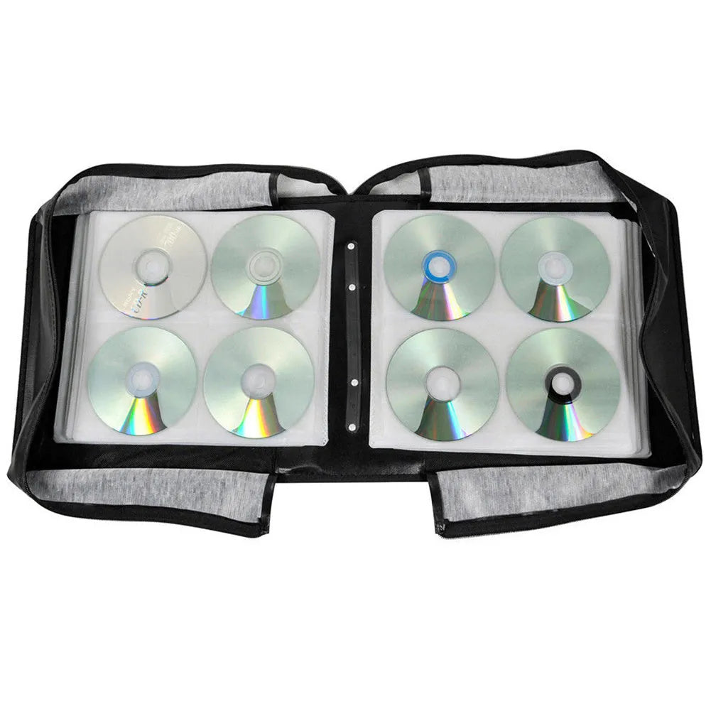 Black Oxford fabric CD storage organiser with a hand strap and zipper, showing capacity for hundreds of discs.