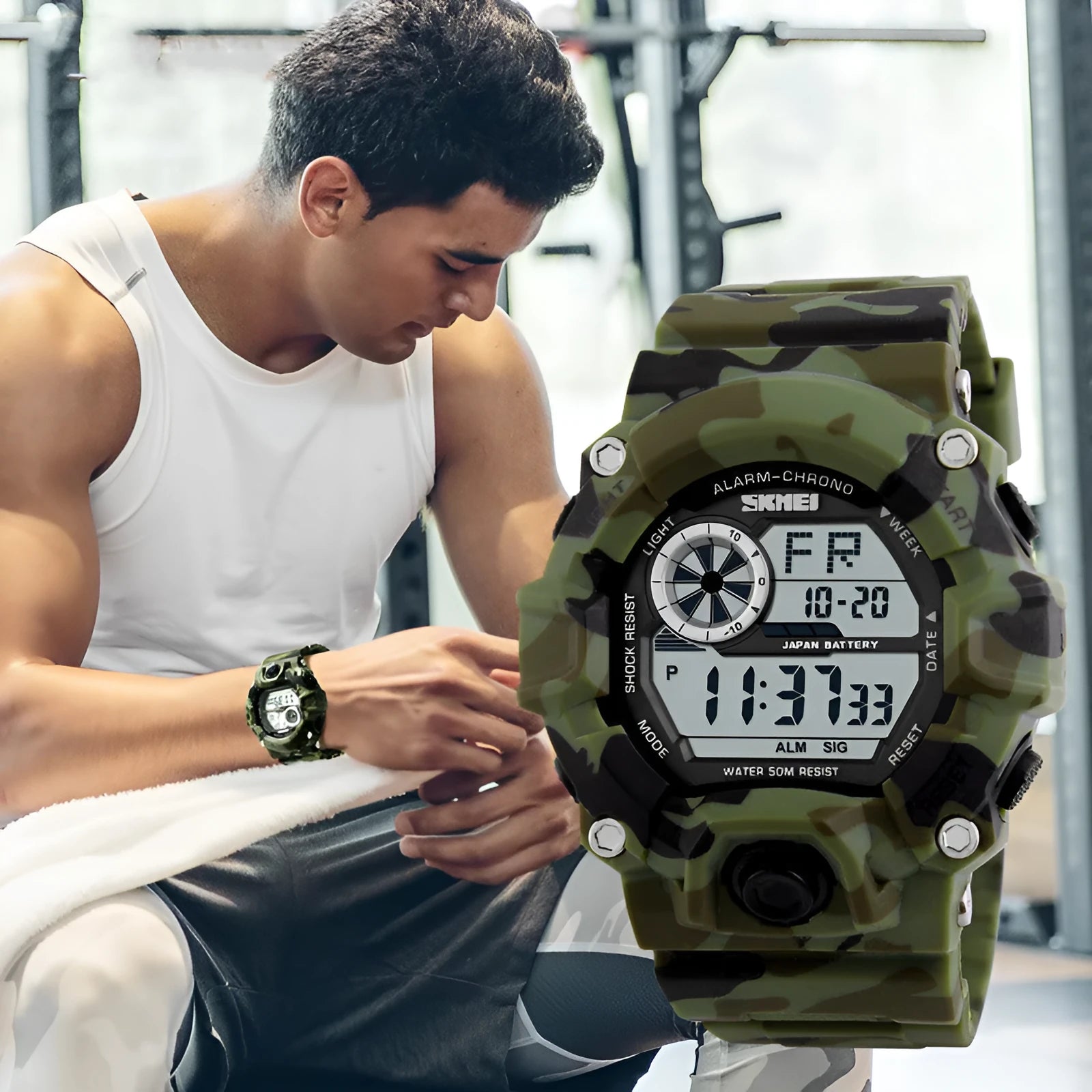 Round dial electronic sports watch with plastic strap in army green, waterproof to 30M.