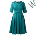 Solid colour African dress with half sleeves and a matching belt, shown on a hanger.