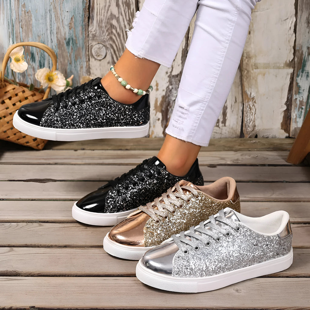 Women's plus size black lace-up board shoes with round toe and flat rubber sole.
