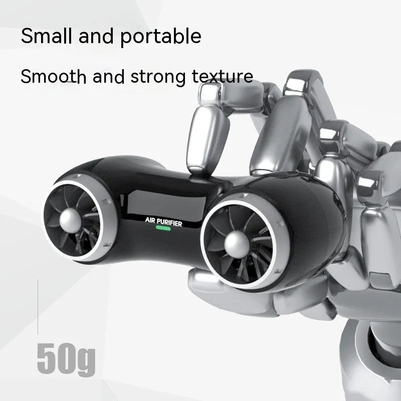 Compact black car air purifier with anion and aromatherapy functions for vehicle use