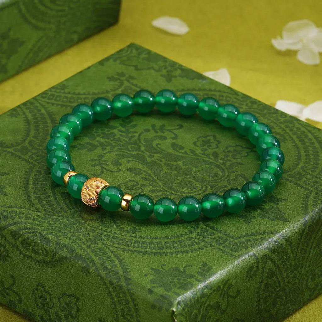 Green agate and S925 sterling silver bracelet with yellow gold accents and a 6mm round stone.