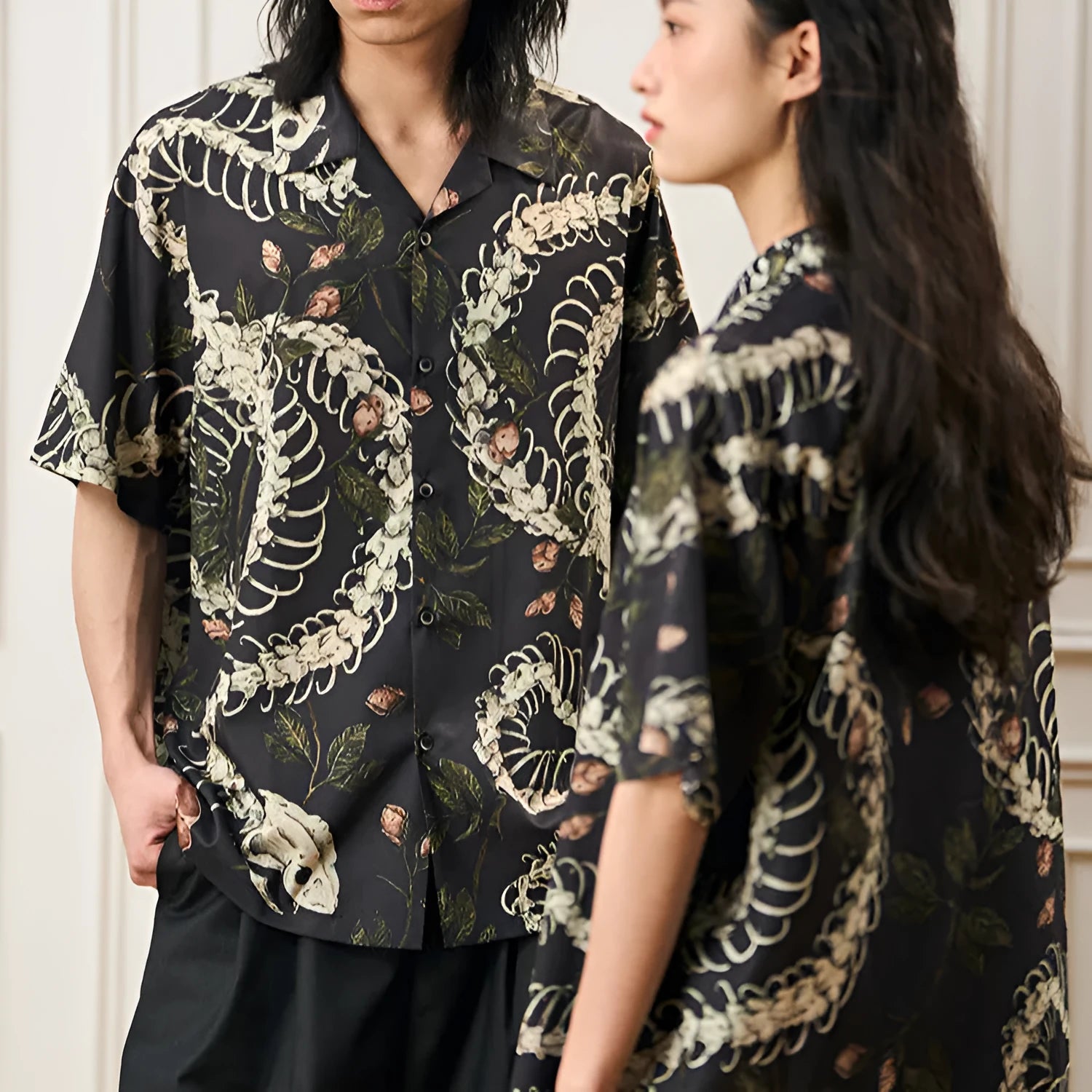 Short sleeve Cuban collar shirt with a snake bone and floral pattern in a loose fit.