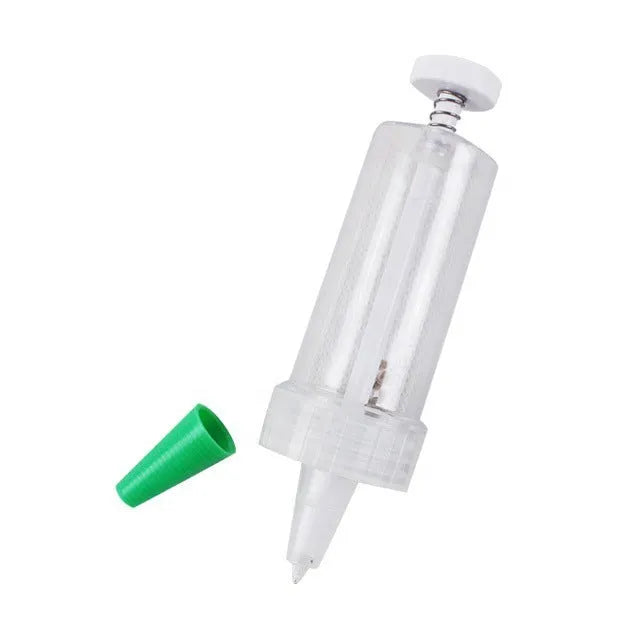 Compact 12 cm long plastic mini planter tool for sowing seeds in pots and trays.