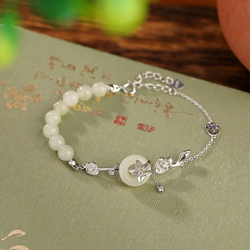 Women's Hetian jade lotus peace buckle bracelet in 925 silver with antique gold or silver plating