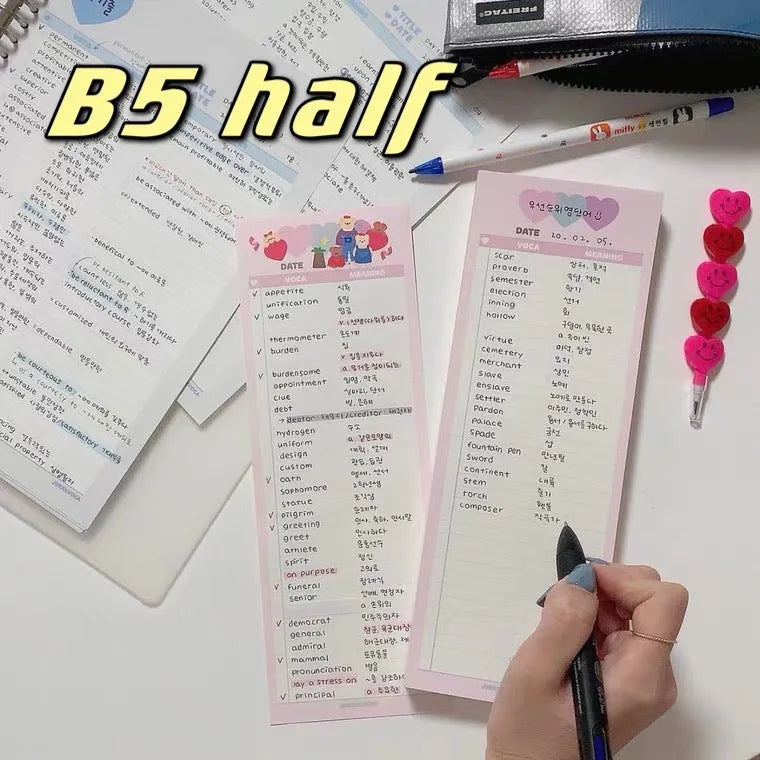 Vertical format English vocabulary notepad in B5 half size showing pink cover and double-sided printed pages