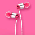 Black wired in-ear headphones with 3.5mm plug, silicone tips, and an inline microphone on the cable.
