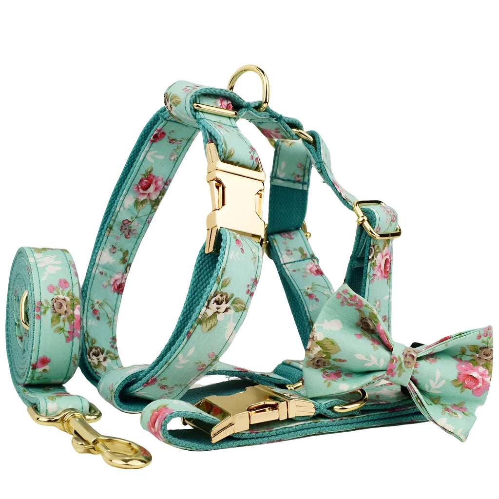 Rose pattern dog collar set on green background with detachable bow and matching leash