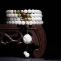 White jade bodhi bead bracelet with 6x8mm beads in traditional styles