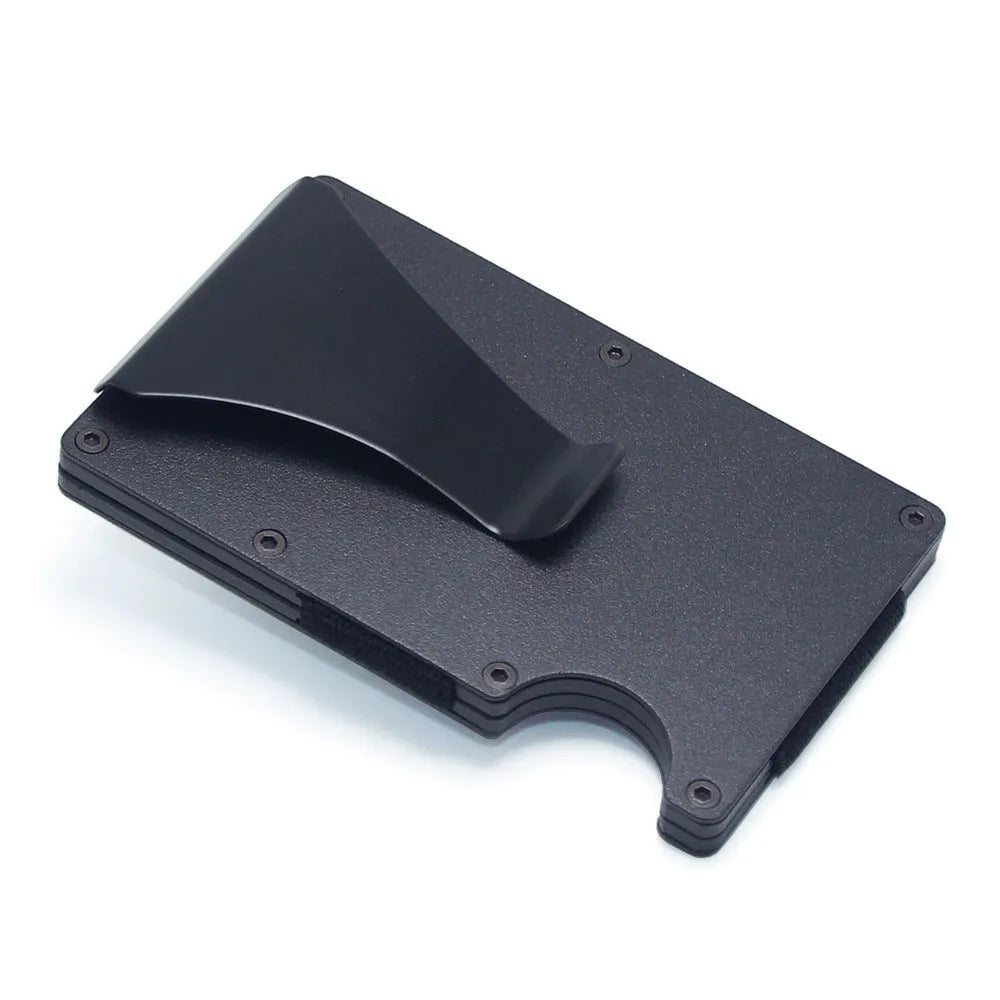 Slim black carbon fibre card holder wallet with geometric design on a gift box.