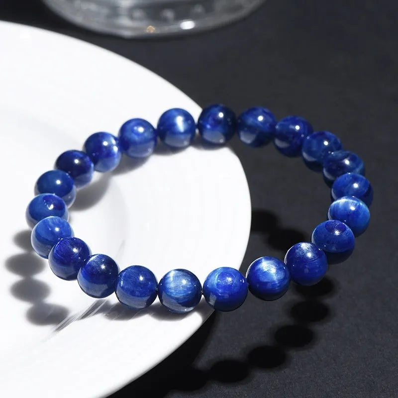 Blue crystal ball bracelet with polished 10-12mm spherical beads in single circle geometric design