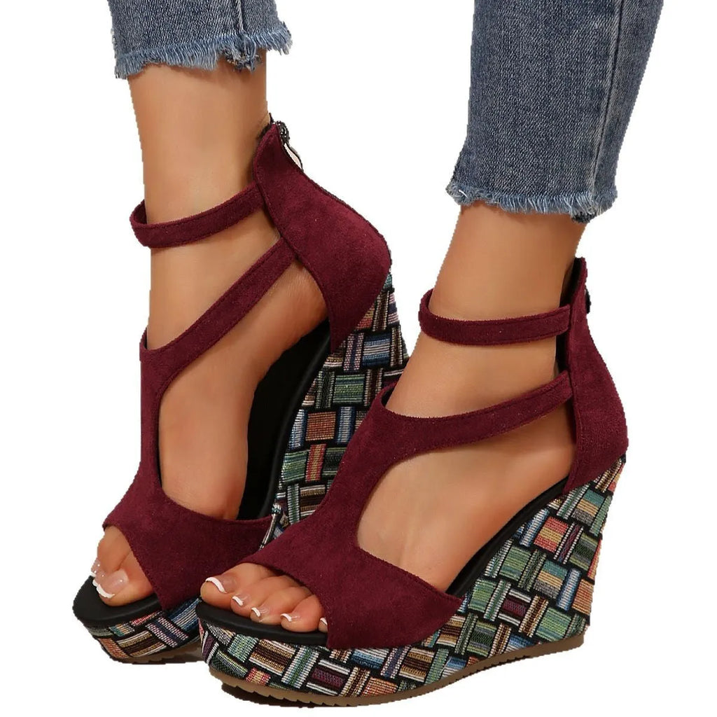 Women's cream white ankle-strap sandals with thick rubber sole and buckle fastening.
