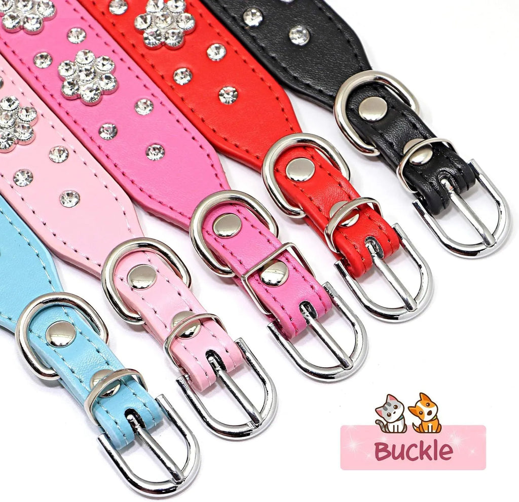 Close-up of a decorative black dog collar with sparkling rhinestone flowers and studs on PU leather.