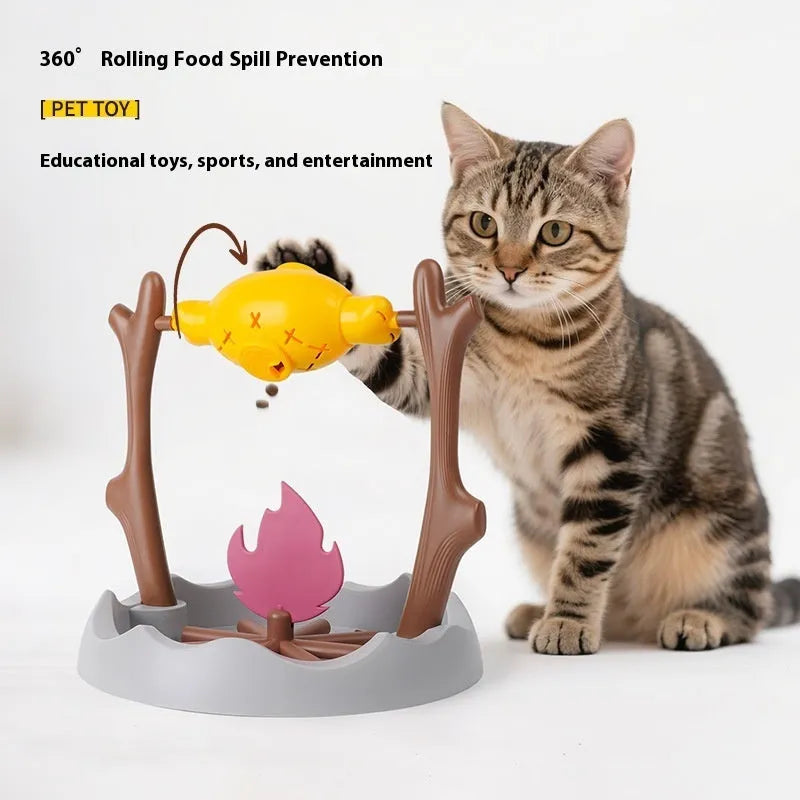 Barbecue-themed tumbling plastic cat food feeder toy for interactive play and slow feeding.