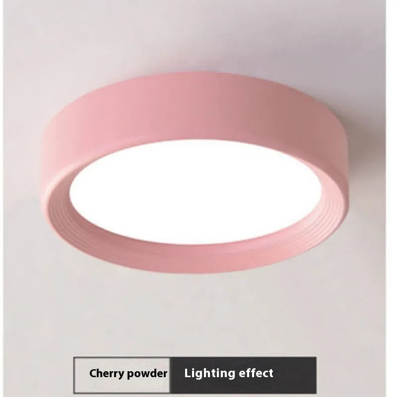 Ultra-thin surface mounted LED downlight in a choice of coloured aluminium shells.