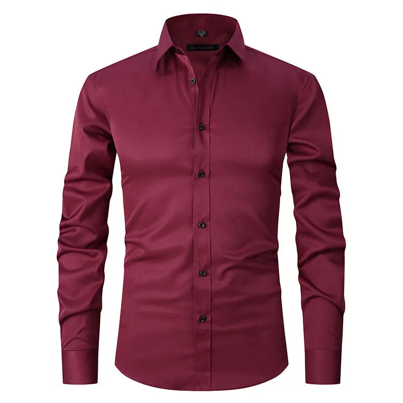 Man wearing a solid-colour stretch long sleeve work shirt made from polyester fabric.